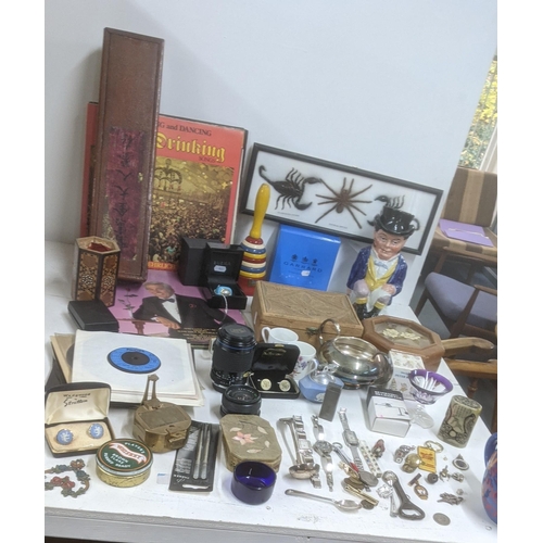 105 - A mixed lot to include a Dunhill lighter, a Zeiss Jena camera lens, three ladies wristwatches, a Tob... 