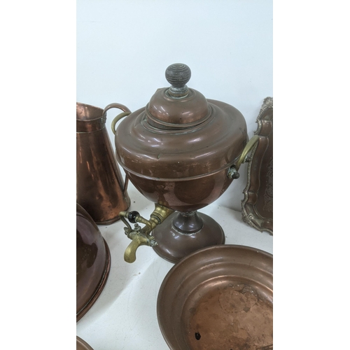 110 - A mixed lot of copper wear to include a Victorian brass and copper samovar, a meat cover, jugs and d... 