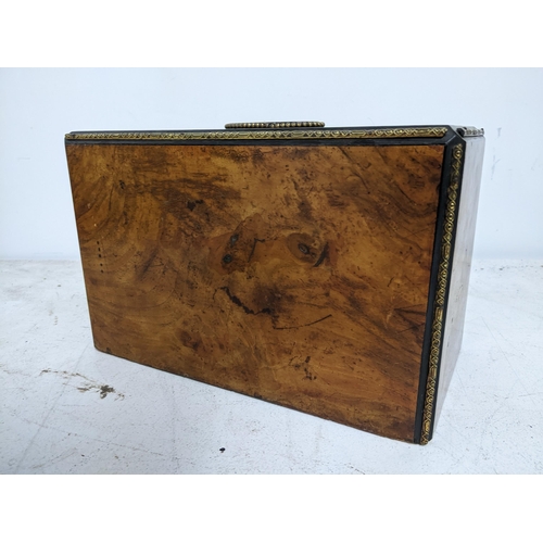 43 - A Victorian walnut cigar /pipe box, the swivel front with fitted interior and lock with key, the fro... 