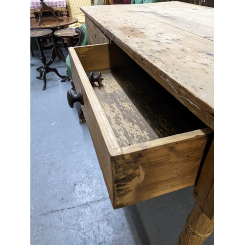 61 - A Victorian 19th century faux bamboo stripped pine side table, two frieze drawers on ring turned leg... 