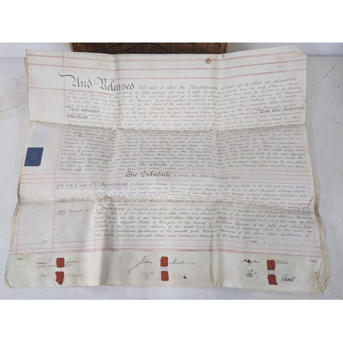 89 - Seven indentures relating to buying and selling agreements along with a modern reproduction of a map... 