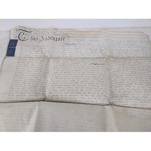 89 - Seven indentures relating to buying and selling agreements along with a modern reproduction of a map... 