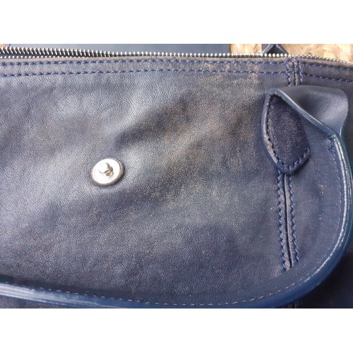 11 - Longchamp-A navy leather Pilage crossbody bag, made in Morocco, serial number partly worn on label h... 