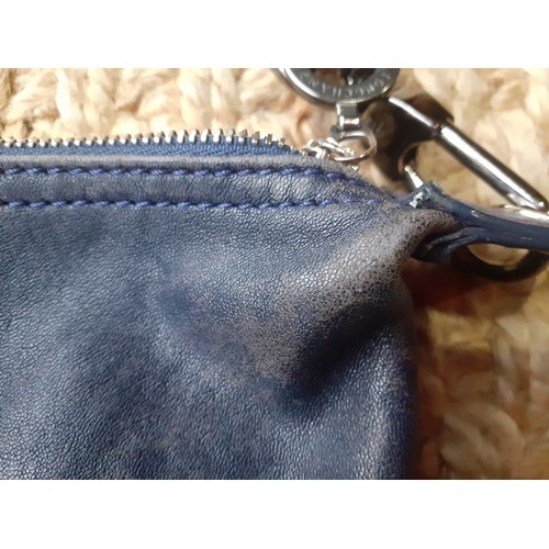 11 - Longchamp-A navy leather Pilage crossbody bag, made in Morocco, serial number partly worn on label h... 