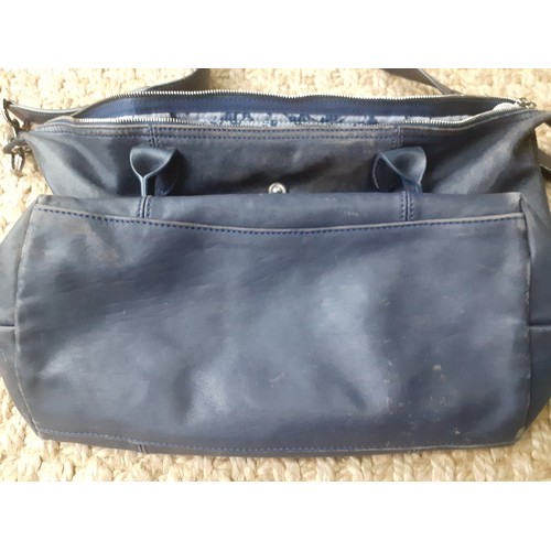 11 - Longchamp-A navy leather Pilage crossbody bag, made in Morocco, serial number partly worn on label h... 