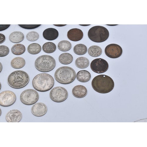 83 - British and Colonial Coinage - A collection to include Edward VII 1907 Threepence, and a pair of 191... 