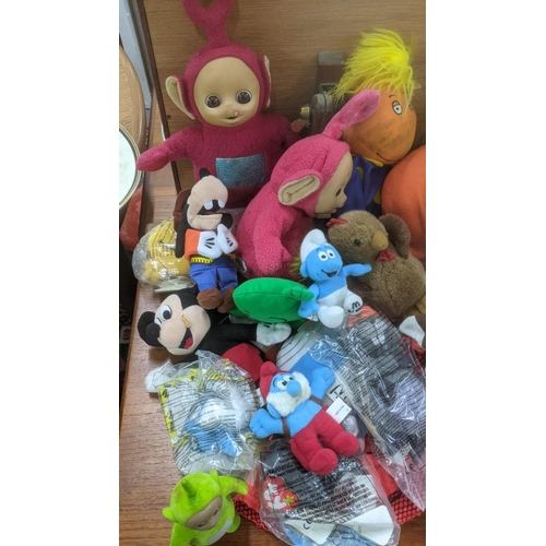 118 - A large collection of teddy bears and stuffed toys to include two Rag dolls, examples from Telebubbi... 