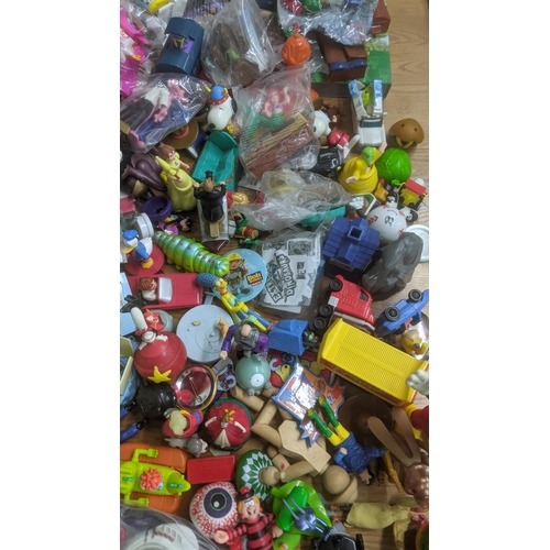 119 - A large collection of children's toys to include Lego, Tom and Jerry, Teenage Mutant Ninja Turtles, ... 