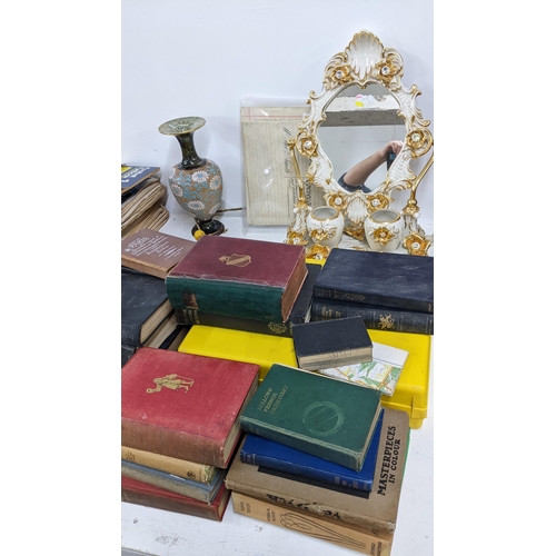 524 - A mixed lot to include a Capodimonte porcelain dressing table mirror, indentures, books, clocks, box... 