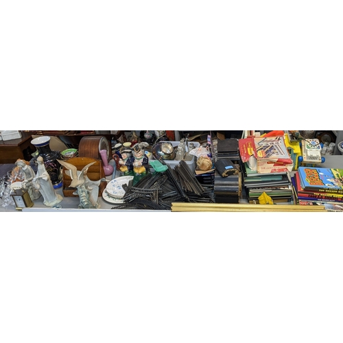 525 - A mixed lot to include mantel clocks, Lladro, Toby jugs, books, coinage clock and other items Locati... 