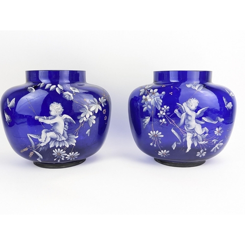 30B - A pair of Victorian blue glass and enamel vases, decorated with cherubs, flowers, and butterflies, 1... 