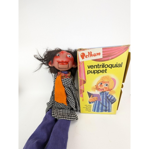 52B - A Pelham ventriloquial puppet, wearing a check jacket and blue and blue trousers, boxed

Location:7.... 