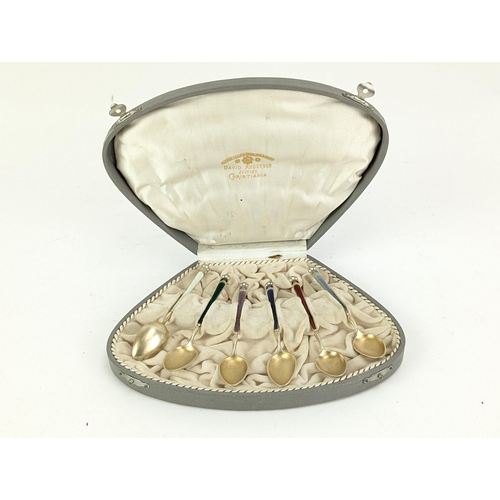 52C - A set of six succession silver gilt and enamelled coffee spoons by David Anderson, stamped 925, and ... 