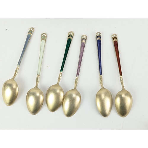 52C - A set of six succession silver gilt and enamelled coffee spoons by David Anderson, stamped 925, and ... 