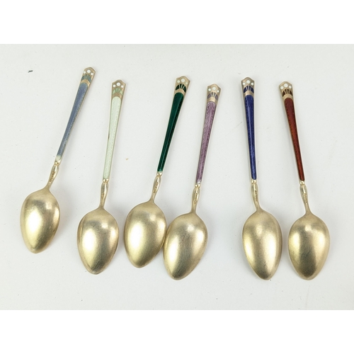 52C - A set of six succession silver gilt and enamelled coffee spoons by David Anderson, stamped 925, and ... 