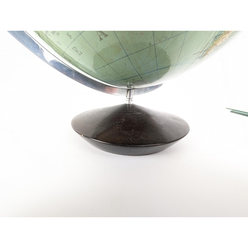 84A - A mid 20th century Columbus Erdglobus German globe, on a domed wooden stand, 32cm high

Location:
If... 