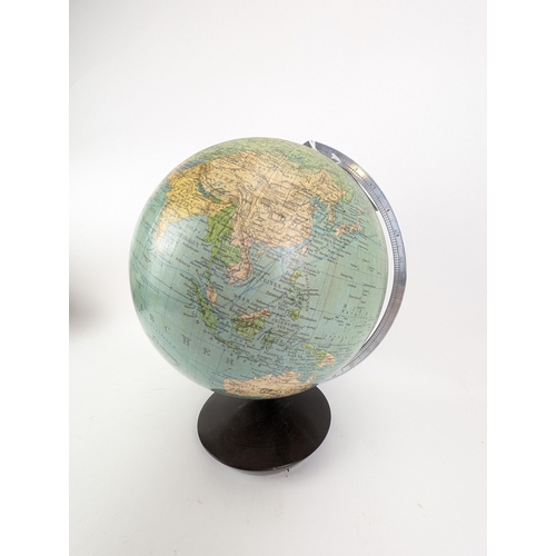 84A - A mid 20th century Columbus Erdglobus German globe, on a domed wooden stand, 32cm high

Location:
If... 