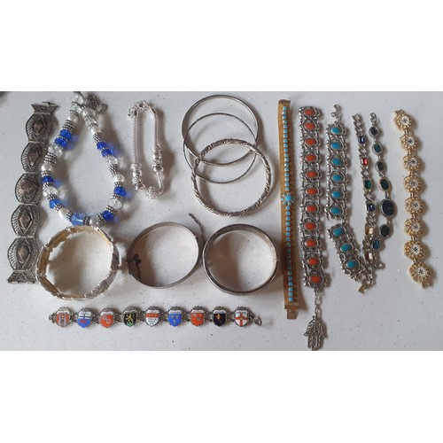 20 - A quantity of vintage costume jewellery comprising brooches  A/F and necklaces to include a silver t... 