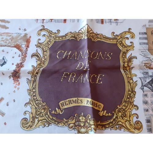 1 - Hermes- A 1970's 'Chansons de France' silk scarf designed by Phillippe Ledoux in brown, cream and go... 