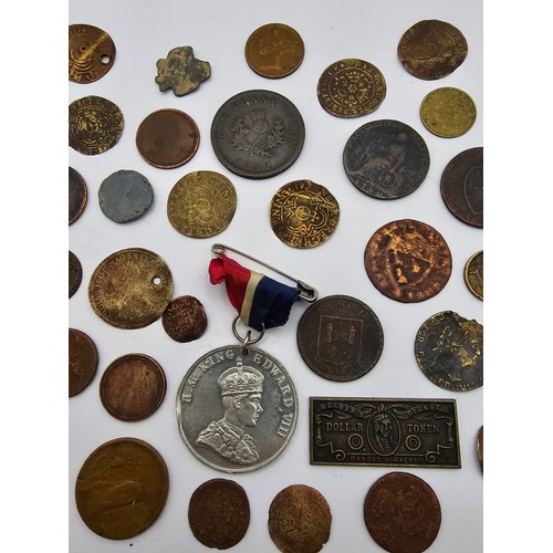 127 - A mixed collection of Tokens, Nuremberg Jettons, Medals, and others, to include George IV Nova Scoti... 