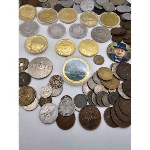 102 - A collection of mixed world coins to include, USA, Germany, France, UK and Commonwealth and others a... 