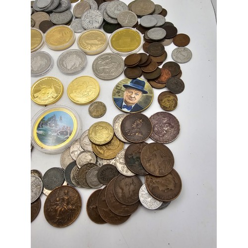 102 - A collection of mixed world coins to include, USA, Germany, France, UK and Commonwealth and others a... 