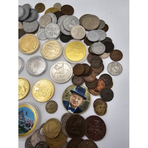 102 - A collection of mixed world coins to include, USA, Germany, France, UK and Commonwealth and others a... 