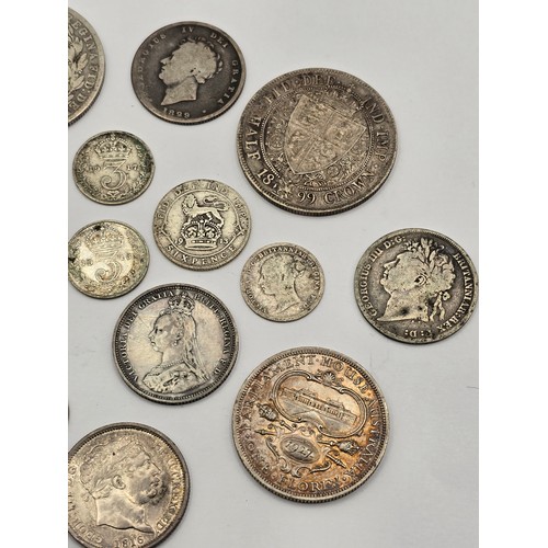 73 - A collection of British Silver Coinage to include a George III 1816 'Bull Head' Shilling, Victoria 1... 