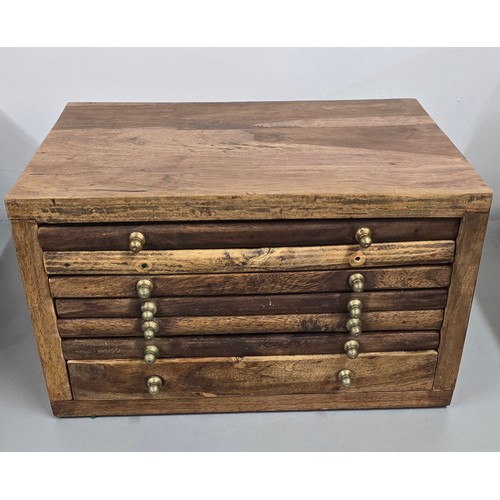 85 - A collectors chest of seven drawers A/F, containing a selection of Victorian and later coins to incl... 