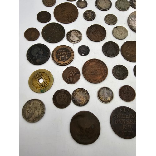 96 - A collection of 18th Century and later coinage from around the world to include, USA 1887 'Morgan' D... 