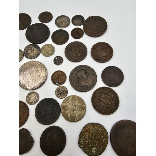 96 - A collection of 18th Century and later coinage from around the world to include, USA 1887 'Morgan' D... 