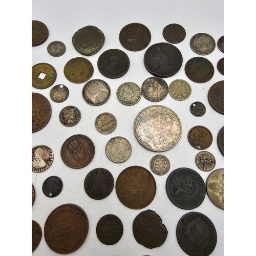 96 - A collection of 18th Century and later coinage from around the world to include, USA 1887 'Morgan' D... 