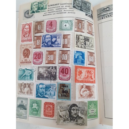 492 - A vintage collection of stamps in stock books, on franked envelopes, loose and in albums to include ... 