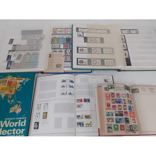 492 - A vintage collection of stamps in stock books, on franked envelopes, loose and in albums to include ... 