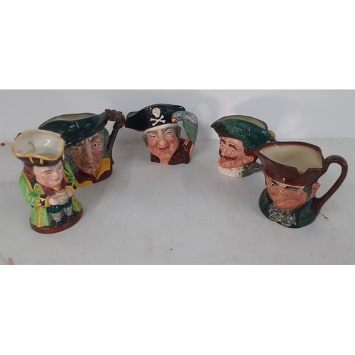 499 - Four Royal Doulton Toby jugs to include The Pied Piper and a Royal Winton character jug. Location:2.... 