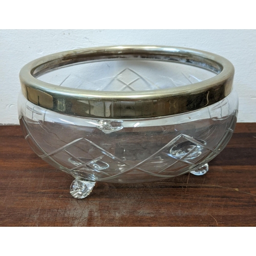 464 - An EPNS rimmed bowl and eight glass jars, all with silver cups/lids Location: LWB
If there is no con... 