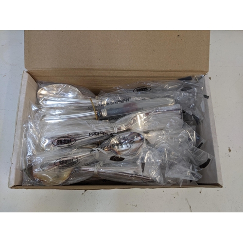 469 - A Viners silver plated canteen of cutlery in a mahogany finished case, and another with additional K... 