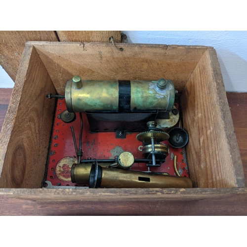 472 - A vintage Bouman Horizontal steam engine circa 1935, in a wooden box
Location: A3B
If there is no co... 