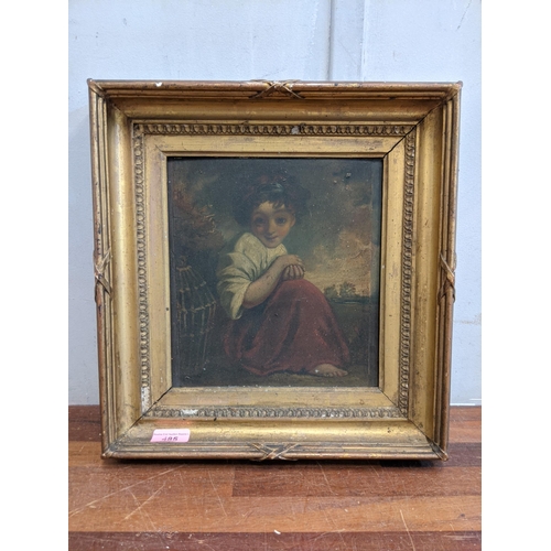 485 - A 19th century school, oil on panel depicting a child crouching and smiling in a gold coloured frame... 