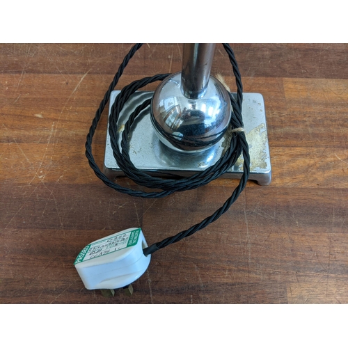 490 - A pair of Art Deco chrome plated desk lamps with round opaline glass shades, re-wired and PAT tested... 