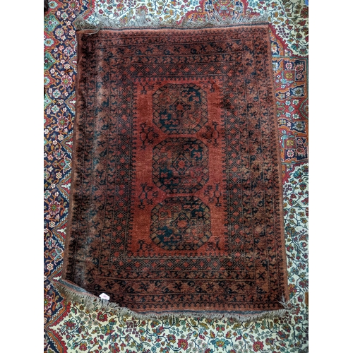 489 - An Afghanistan Bokhara style rug, 145cm x 101cm
Location: g
If there is no condition report shown, p... 