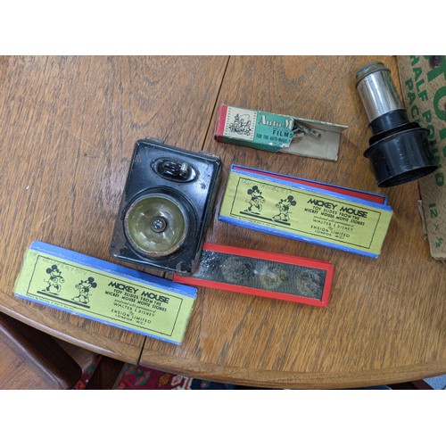 483 - Auto-Magic picture gun with auto magic films and slides including some from Mickey Mouse
Location: a... 