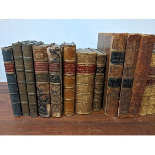 487 - Various leather bound books to include 