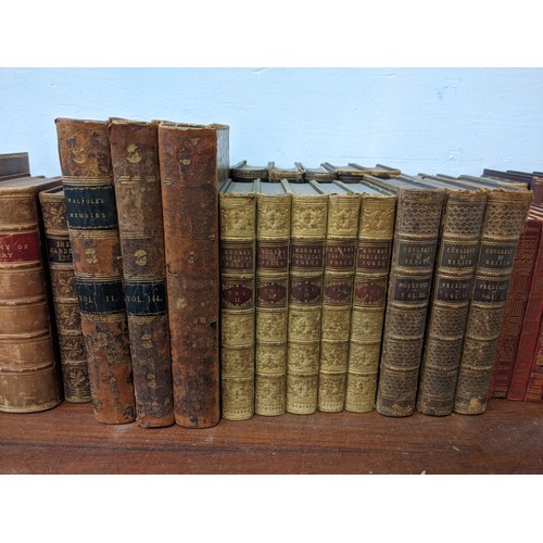 487 - Various leather bound books to include 