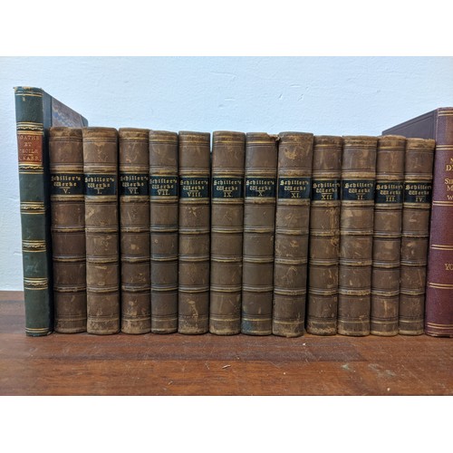 487 - Various leather bound books to include 