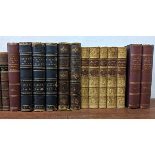 487 - Various leather bound books to include 