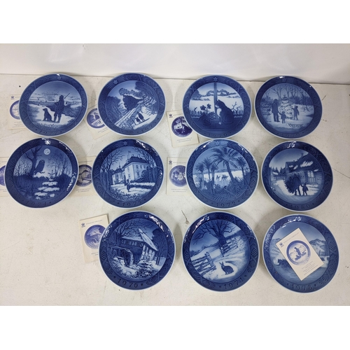 511 - Eleven Royal Copenhagen Christmas plates mainly from the 1970s depicting various winter scenes
Locat... 