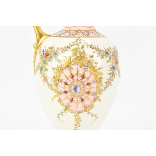 134 - A late 19th century Coalport 'jewelled' ewer, the white and pink ground painted with two panels with... 