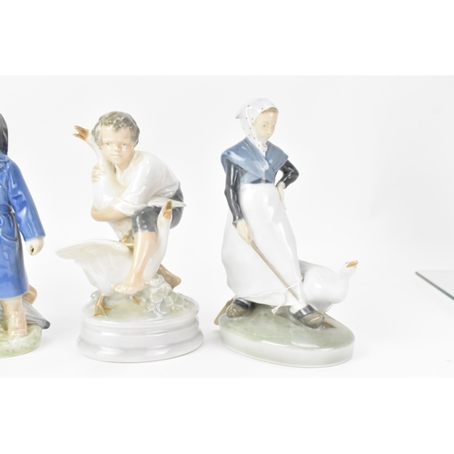 142 - Four Royal Copenhagen porcelain figures to include a girl with a goose, model no. 528, 18.5cm high, ... 