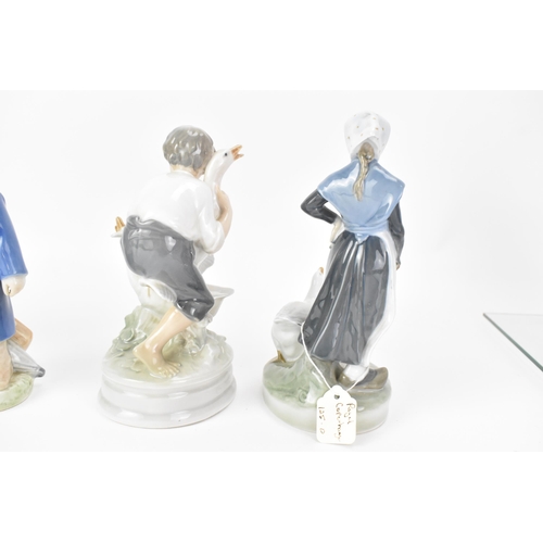 142 - Four Royal Copenhagen porcelain figures to include a girl with a goose, model no. 528, 18.5cm high, ... 